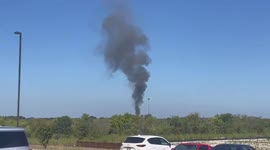 Smoke billows from military jet crash site in Texas that left 2 pilots injured