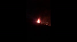 Night time Eruption and lava Flow Footage of La Palma Volcano called Cumbre Vieja