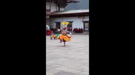 A Buddhist monk perform Mukahta dance