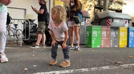 Small Cute Girl Dancing at Outdoor Party in Barcelona