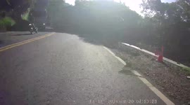 Motorbike rider takes incredible risk and overtakes between two trucks coming from both ways (Dashcam Video)