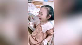 Chinese girl cries tears of joy as she is able to eat meat again after being hospitalised