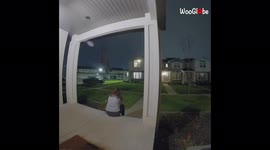 'Woman snapping photos of lightning storm gets scared by the sound of thunder '