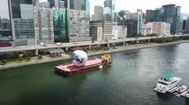 Giant moon-shaped balloon arrives in Hong Kong harbour ahead of mid-autumn festival