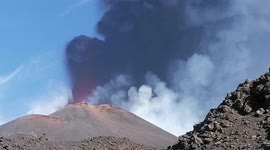 Mount Etna erupts spectacularly spewing ash and lava hundreds of metres into air