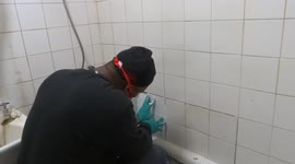 Bathroom tiling in progress at a London flat - basic repairs
