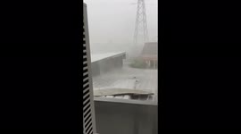 Raise the roof! Top of building flies off amid heavy storm in Indonesia