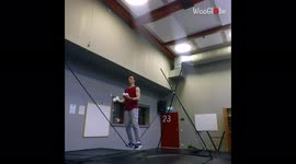 'Swedish artist smoothly juggles 9 balls while standing on a slackline'