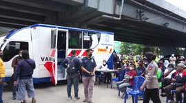 A special vaccine room for Woman who wearing Hijab in a Mobile Police Car
