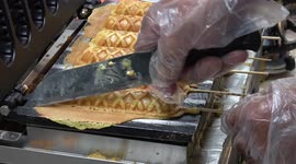 Street Food: Thai stall makes hot dog waffle sticks