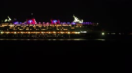 Disney Magic cruise ship illuminated at night in 4K off Kent, UK