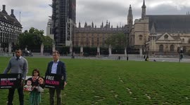 Richard Ratcliffe and daughter play amnesty international snakes and ladders