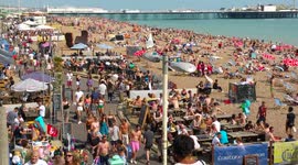 UK hottest day Brighton very crowded beach front