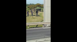 Lorry driver films migrants and police in Calais