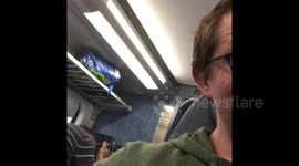 Man shaves head on Jersey train
