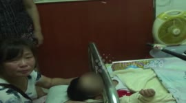 Fire fighters free toddler's head from bed railings