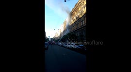 Fire fighters tackle flat blaze in St Petersburg, Russia