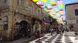 Umbrella Project decorating Nahalat Shiv'a neighborhood in Jerusalem