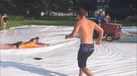 Americans attempt DIY waterskiing with lawnmower
