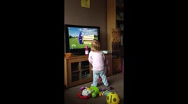 Cute toddler finds teletubbies hilarious