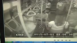 Woman reclines across three seats of busy China bus