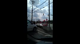 Police respond to unruly protesters that took over a McDonald's.