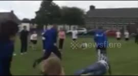 Dad wipes out in Sports Day race