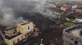 Drone footage from La Palma shows tide of lava devouring buildings in its path