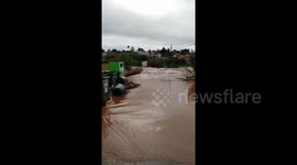 Flash floods turn streets into rivers in western Spain