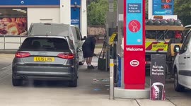 London motorist spotted filling up multiple canisters with fuel as UK petrol stations face supply issues
