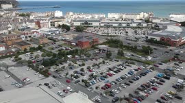 Aerial timelapse shows Welsh motorists queuing to enter petrol station as UK faces driver shortage
