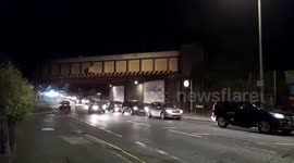 London motorists form long queue for petrol after dark amid panic buying