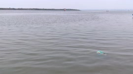 The Dead body floats in India's Ganga river