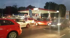 Lengthy queues for only south London petrol station with fuel stocks remaining.