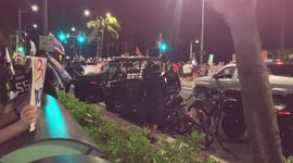 Anti vaccine protesters block Waikiki, AGAIN. Second week Saturday night anti vaccine mixed with pro Trump protestors block Waikiki. - police keeping people in check