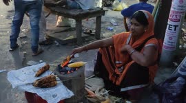 local Indian People's has attraction for healthy food   for Babycorn thats made by indian lady in street