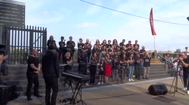 Battersea Power Station Community Choir celebrates new tube station at street festival