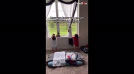 'Adorable twin babies copy mom by acting as if they are making a TikTok 
'