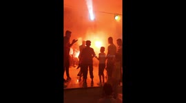 Groom and friends dance with fireworks in wedding In Egypt