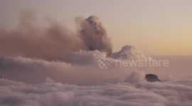 Cumbre Vieja above the clouds, timelapse, sunset.