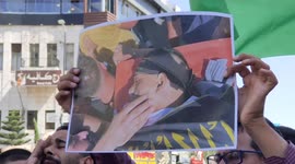 Palestinians take part in a protest to condemn of death of four Palestinians by Israeli forces