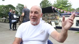 Floating candy store! UK man comes out of retirement to set up a successful sweet shop - on a canal barge