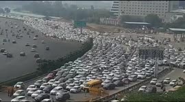 Hundreds of cars stuck in traffic as Indian farmers launch protest against reforms