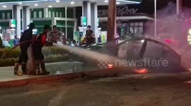 Tesla car bursts into flames as driver loses control