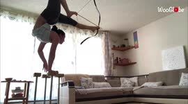 'Mongolian Contortionist demonstrates her unrivaled foot archery skills'