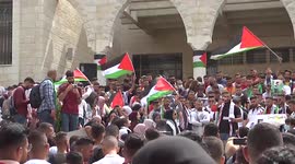 Palestinian students from Birzeit University take part in a protest condemning the killing of five Palestinians by Israeli forces
