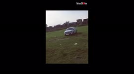 'Hilarious drifting stunt in the field ends with a minor car crash 
'