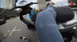 Dramatic footage shows scooter crashing into car in Denmark