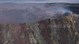 Flyby by the 100 meter main crater of the ongoing eruption in Iceland