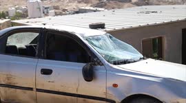 Palestinians inspect the damage of Israeli settlers attack on their houses and cars in Khirbet al-Mafqarah, in the West Bank area of Masafer in Yatta, near of Hebron